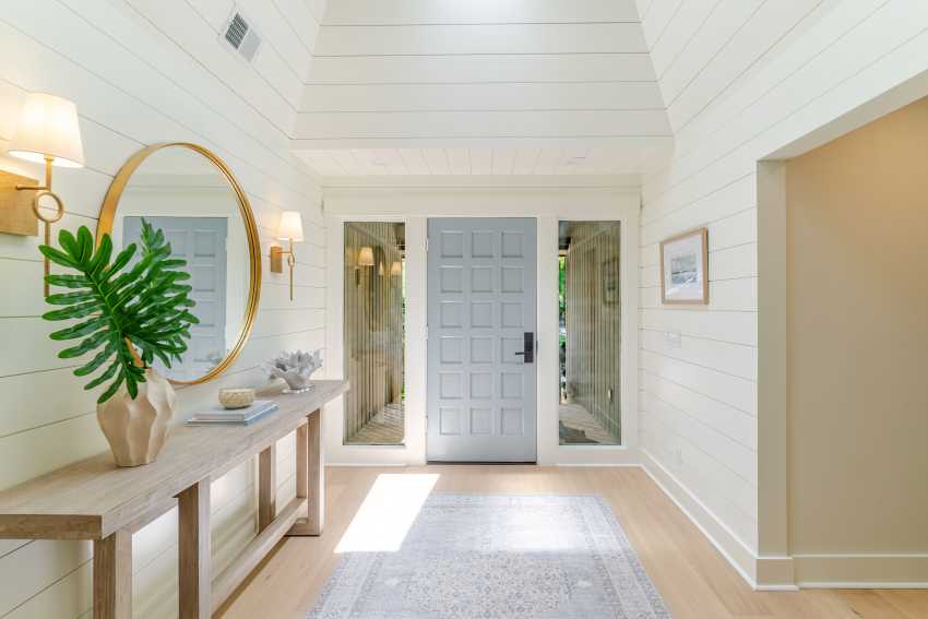 A photograph of the foyer and front door inside a Hilton Head home remodel.